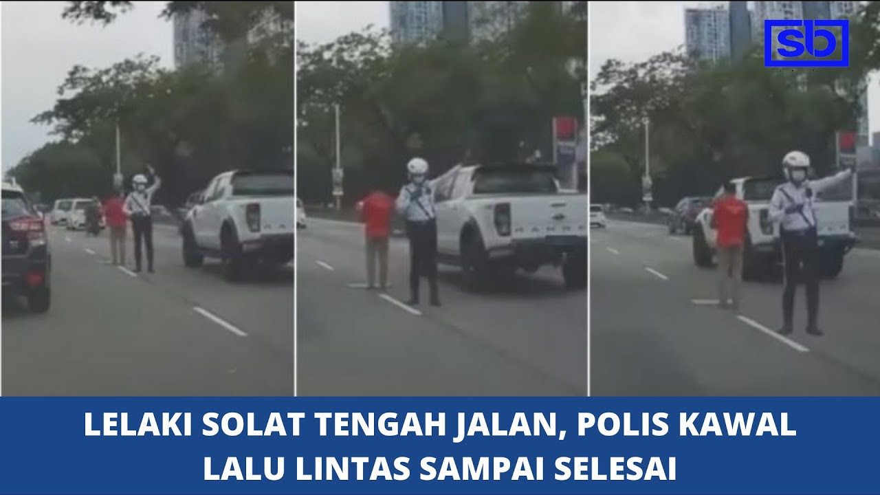 [VIDEO] Lelaki solat tengah jalan, polis kawal lalu lintas sampai selesai