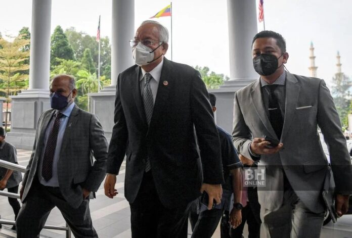Najib Razak ketika menghadiri perbicaraan kes IMDB