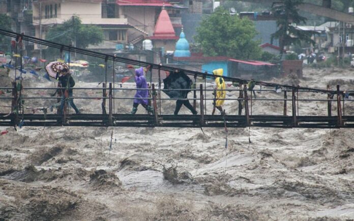 5d88d883-banjir-india-ap-120723